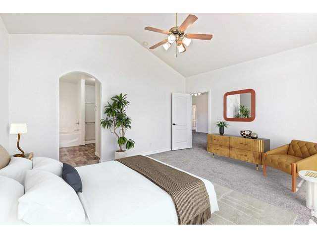 Property Photo 18 Huge primary bedroom with vaulted ceilings