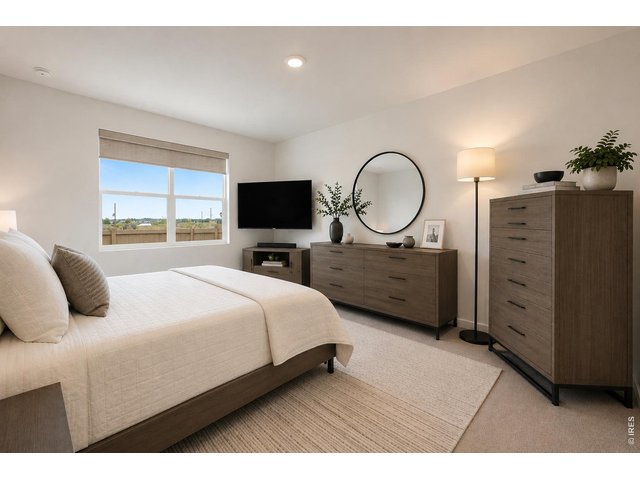Property Photo 12 Spacious primary bedroom-some furniture virtually staged