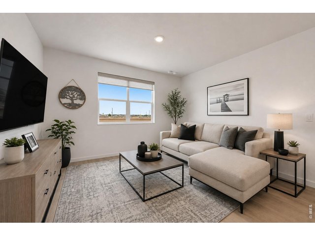 Property Photo 9 Open floor plan living room-some furniture virtually staged