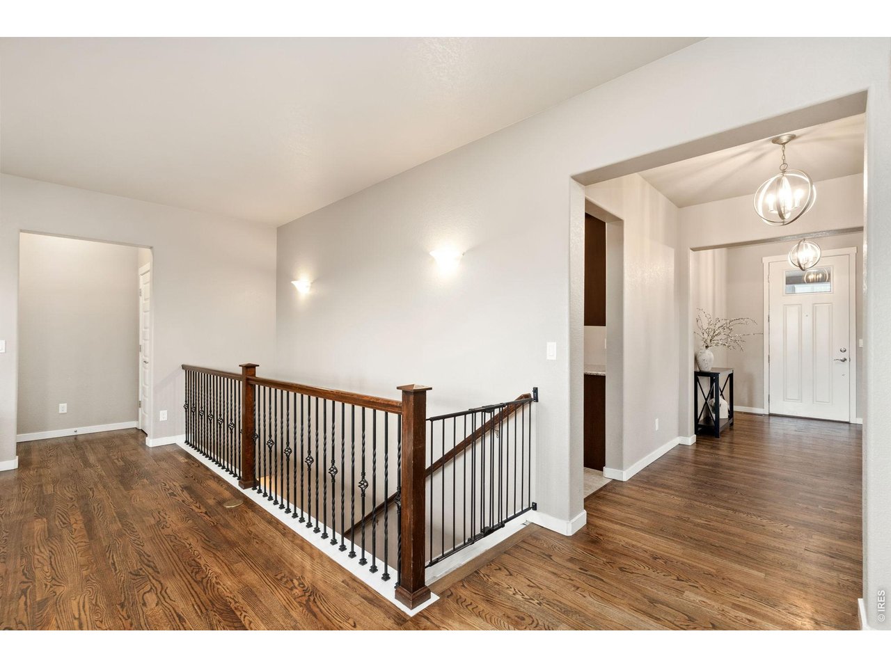 Property Photo 15 Open Stairs to The Expansive Finished Basement