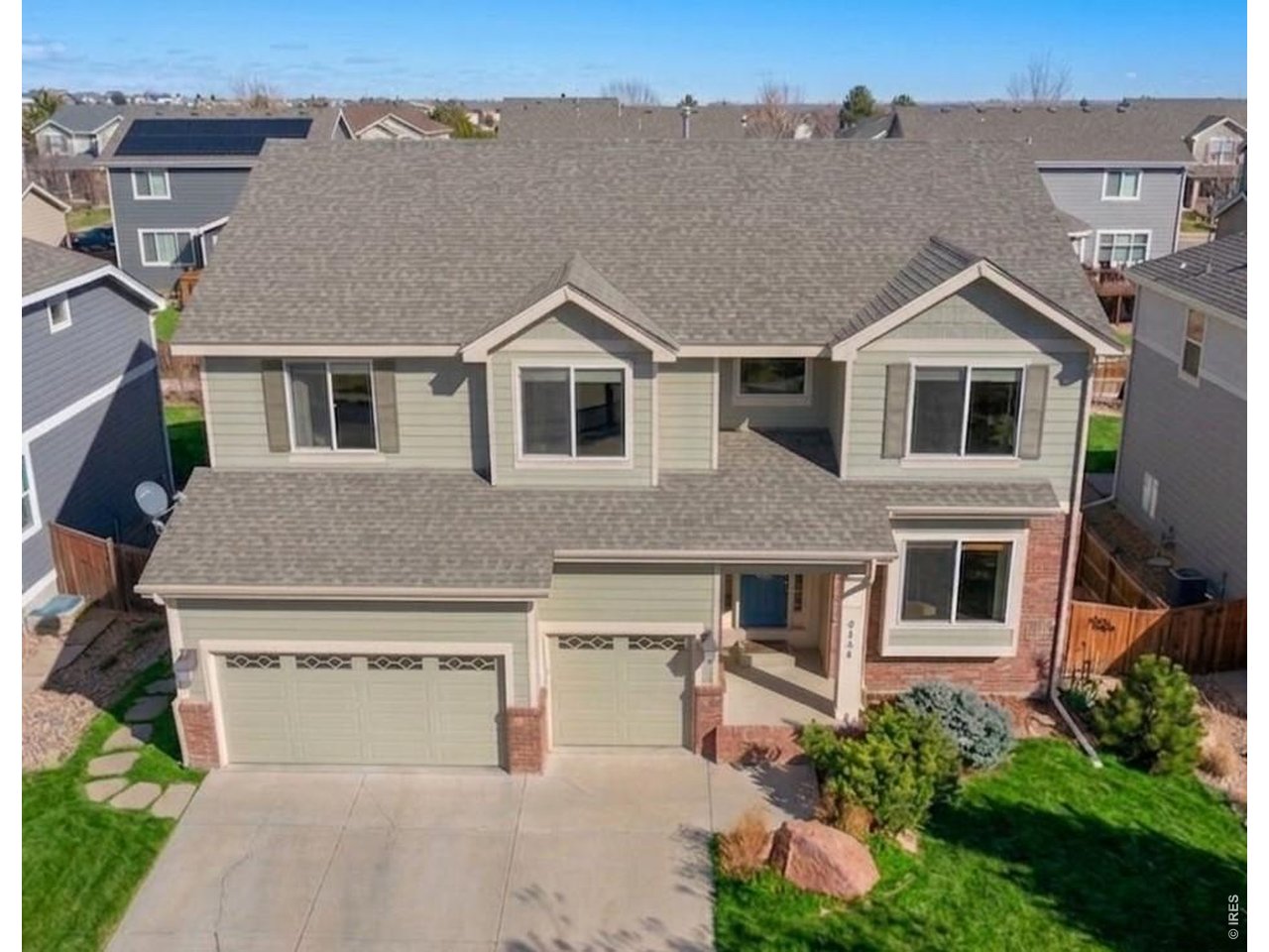 Property Photo 3 Welcome home to 6326 Tilden St in the desirable Westchase community in SE Fort Collins. (*Grass virtually enhanced to reflect current condition)