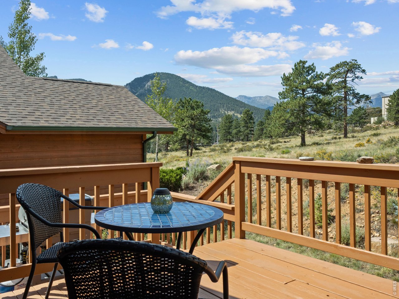 Property Photo 3 A deck with gorgeous mountain views!