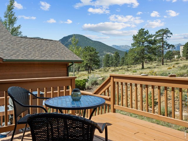 Property Photo 3 A deck with gorgeous mountain views!