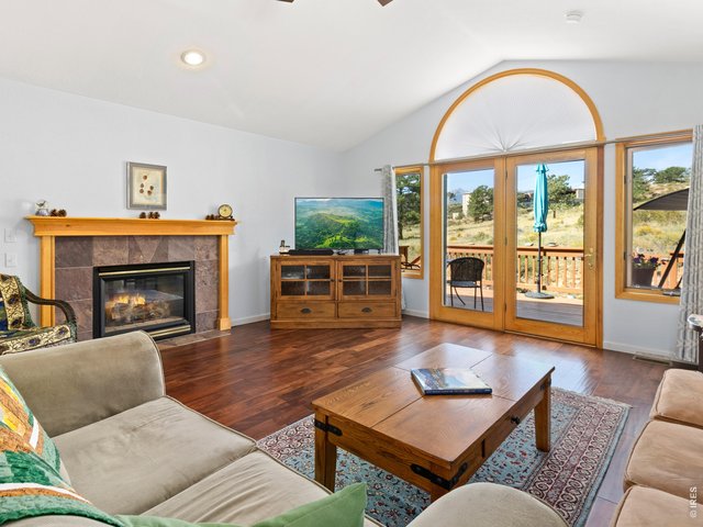 Property Photo 16 Cozy Living area with access to the back deck