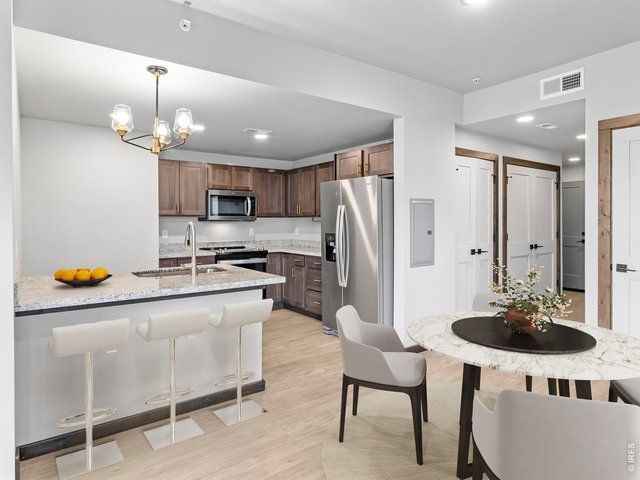 Property Photo 3 Virtually staged dining area