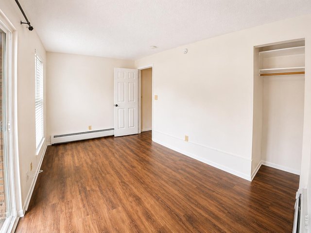 Property Photo 5 Primary Bedroom - Main Floor