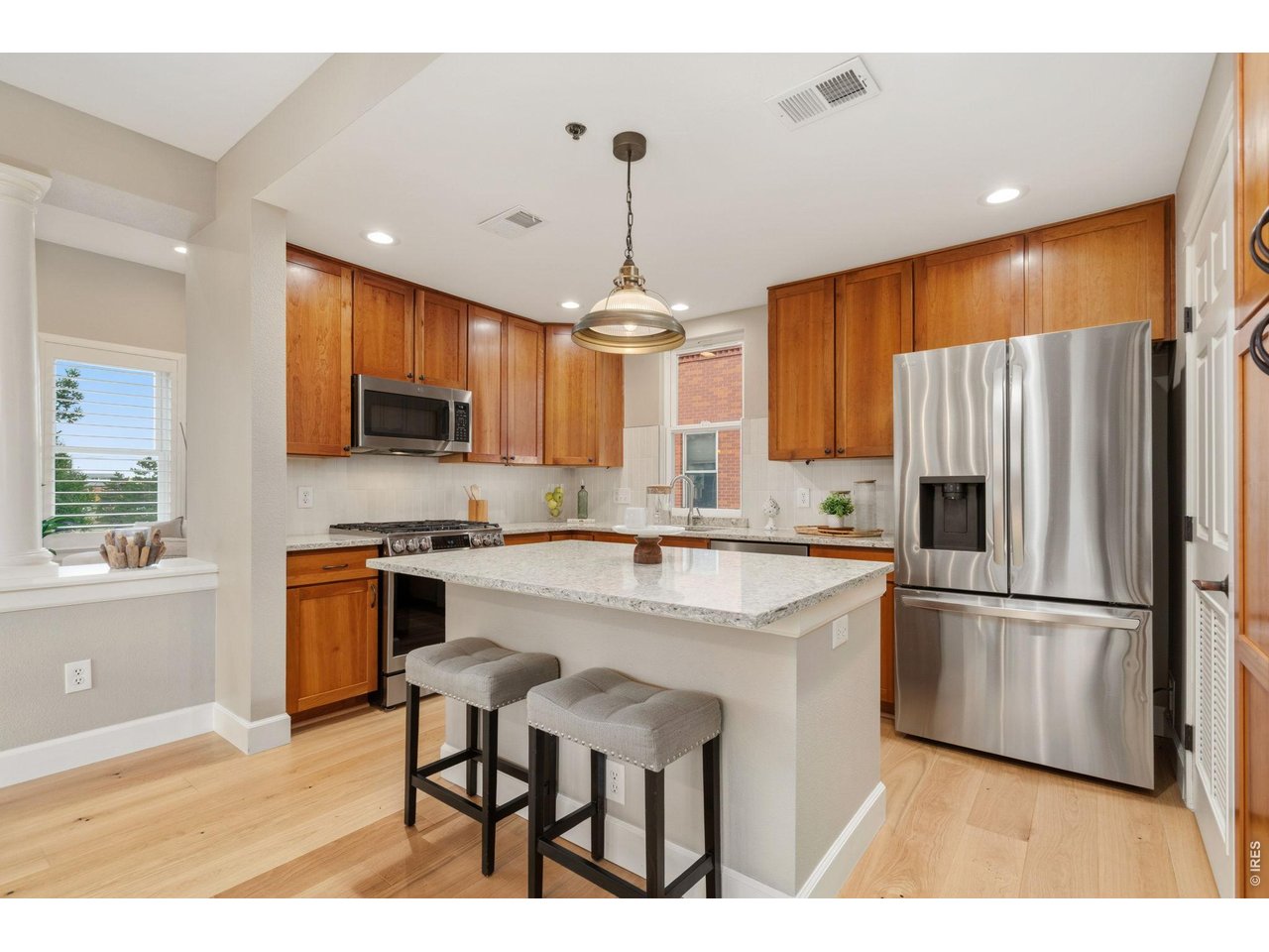 Property Photo 11 Well appointed kitchen includes all stainless-steel appliances and gas, range/oven.