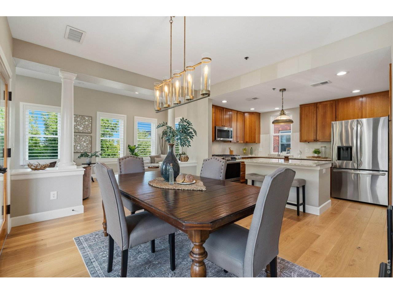 Property Photo 9 Open concept floor plan provides an open kitchen, dining room and living room spaces.
