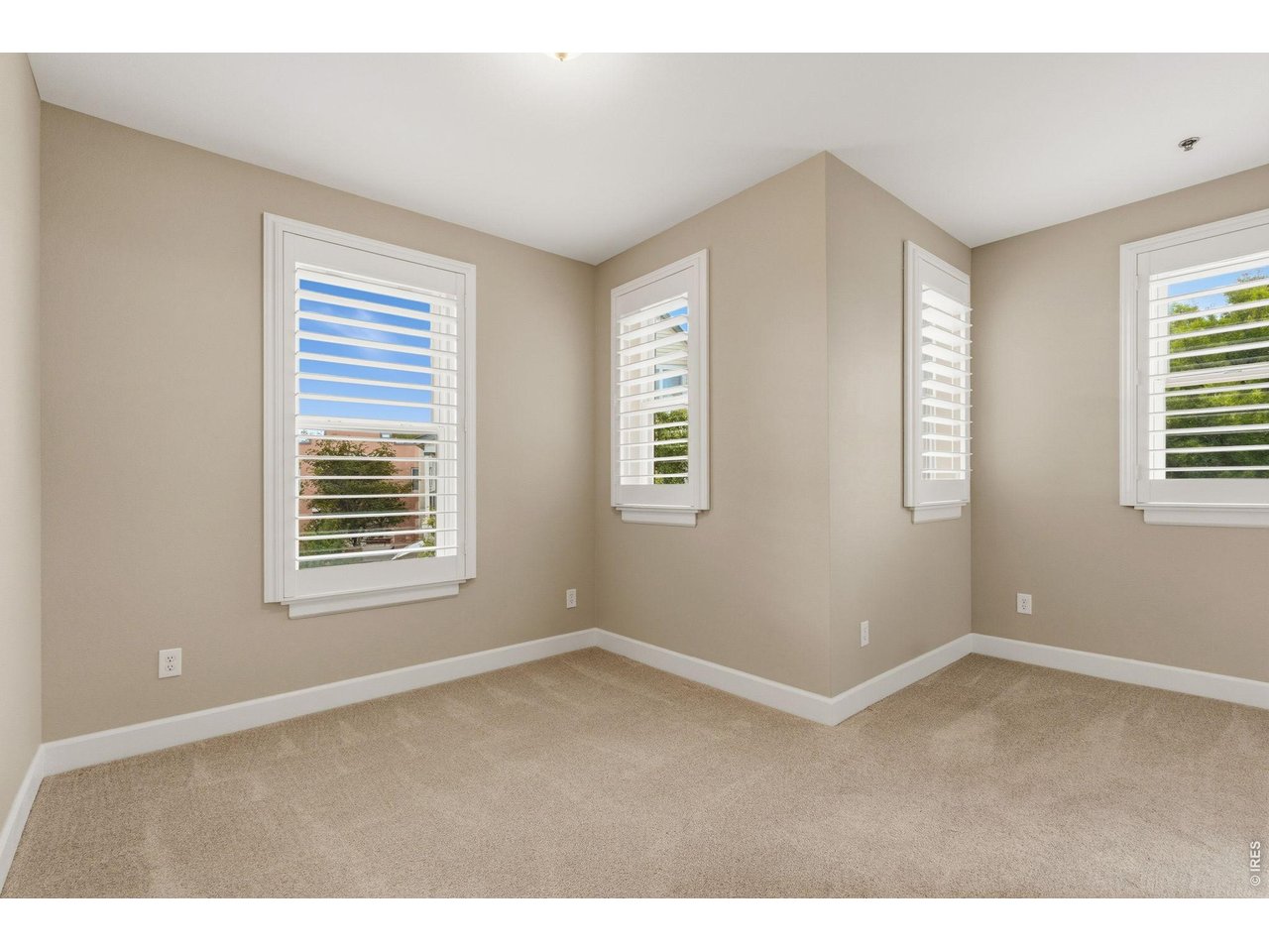 Property Photo 26 Bedroom 3 offers new carpet and a peak a boo mountain view!