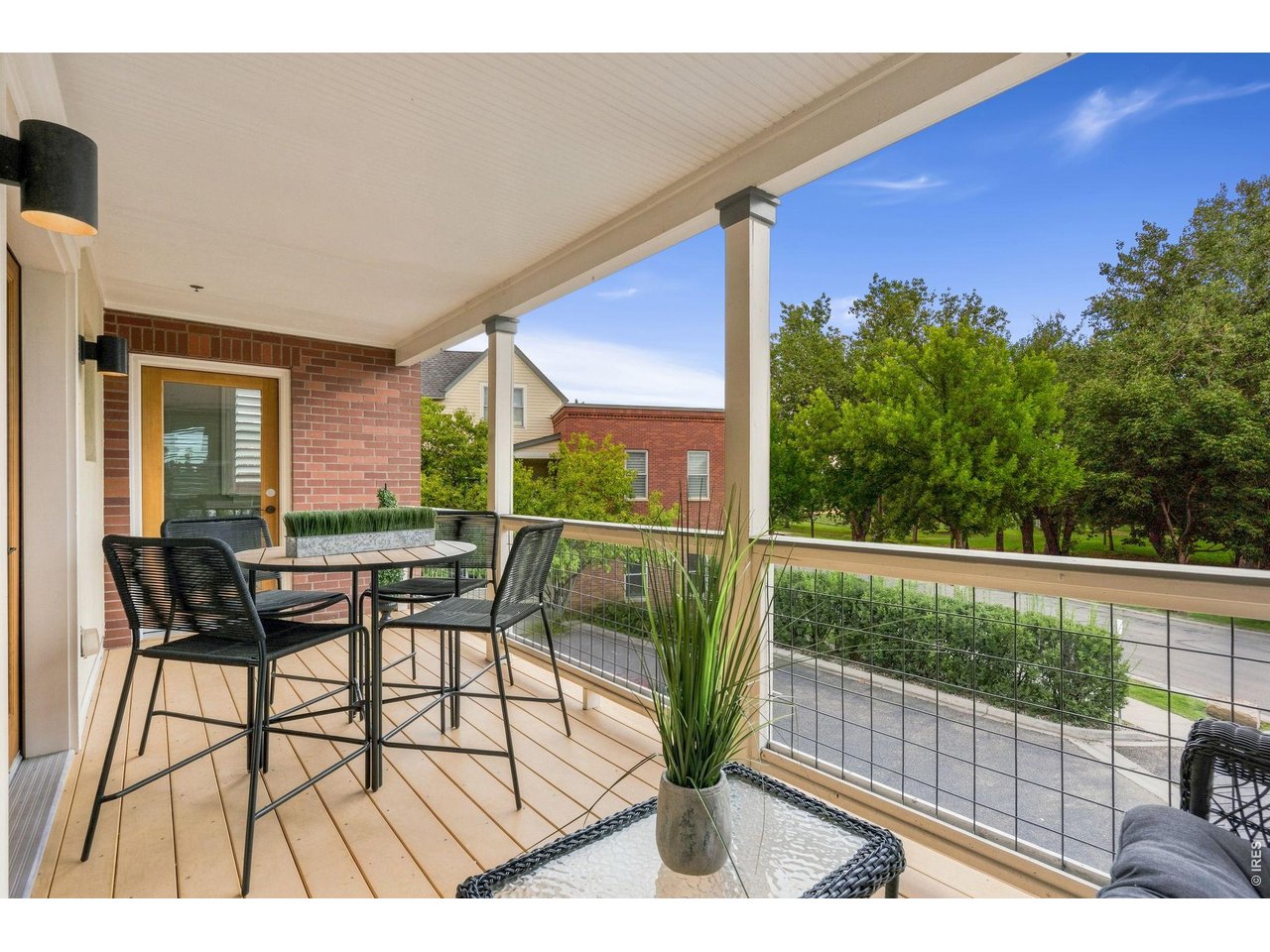 Property Photo 17 The composite deck is perfect for dining al fresco and entertaining with a cover and northern exposure.