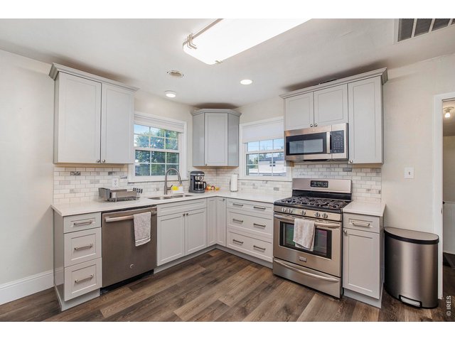 Property Photo 19 Quartz countertops, Tiled backsplash, Gas Range.