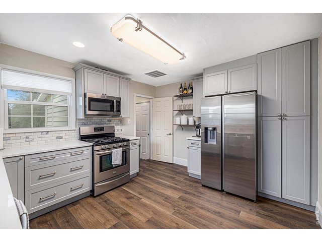 Property Photo 20 Plenty of Cabinetry for storage and stainless steel appliances