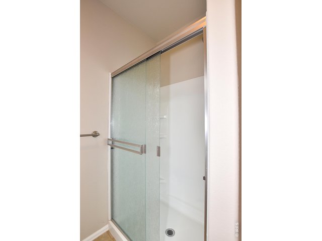 Property Photo 33 Primary Bathroom Walk-In Shower