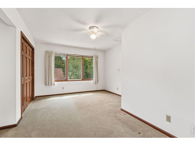 Property Photo 30 More Loft Views showing the windows which offer scenic views of the front yard and natural light.