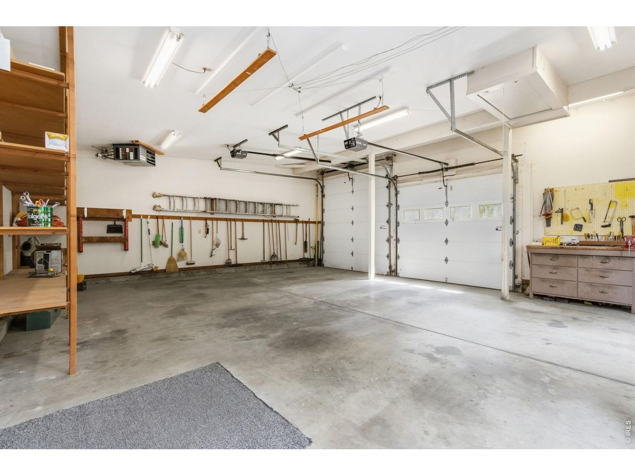 Property Photo 37 Insulated and heated oversized garage, complete with >8 & RV doors!