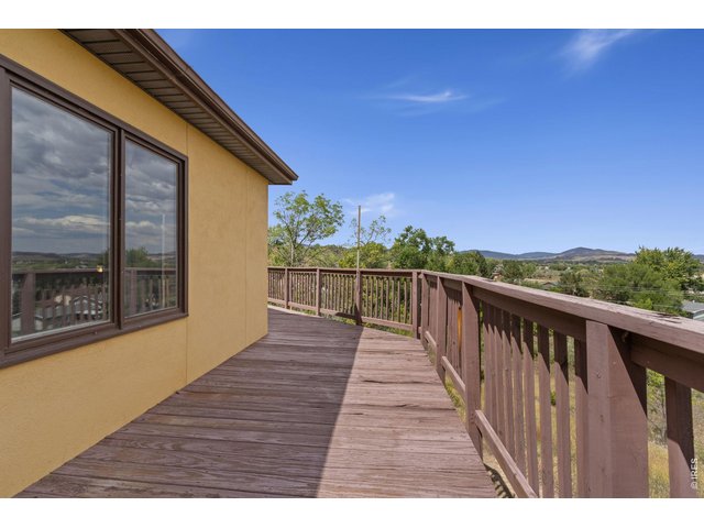 Property Photo 40 Spectacular views of foothills and Boedecker Lake from the deck!