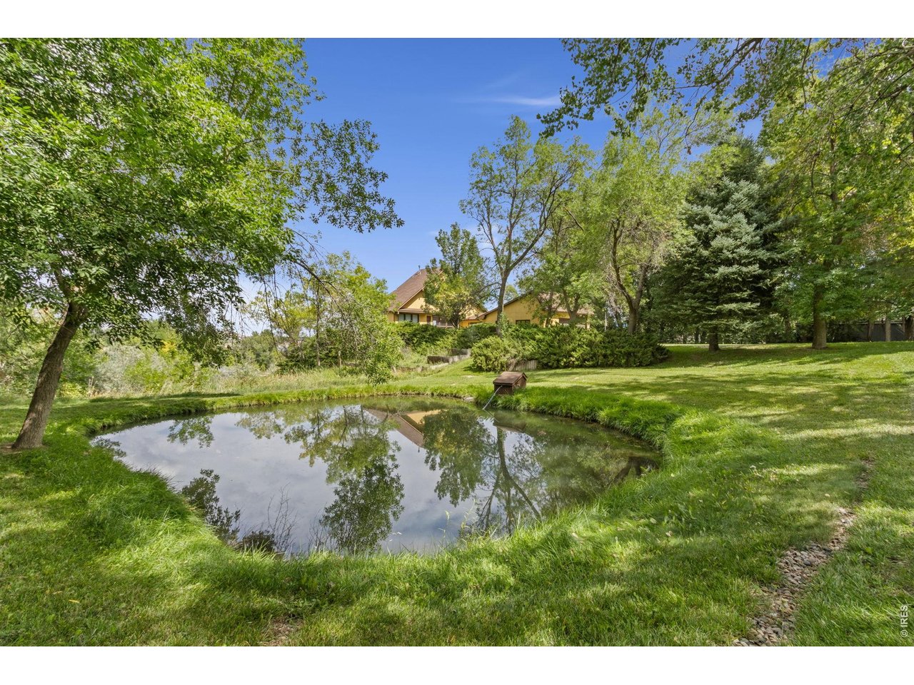 Property Photo 1 Truly special home on 1.82 irrigated acres with private pond- 5153 Single Tree Dr, Loveland CO