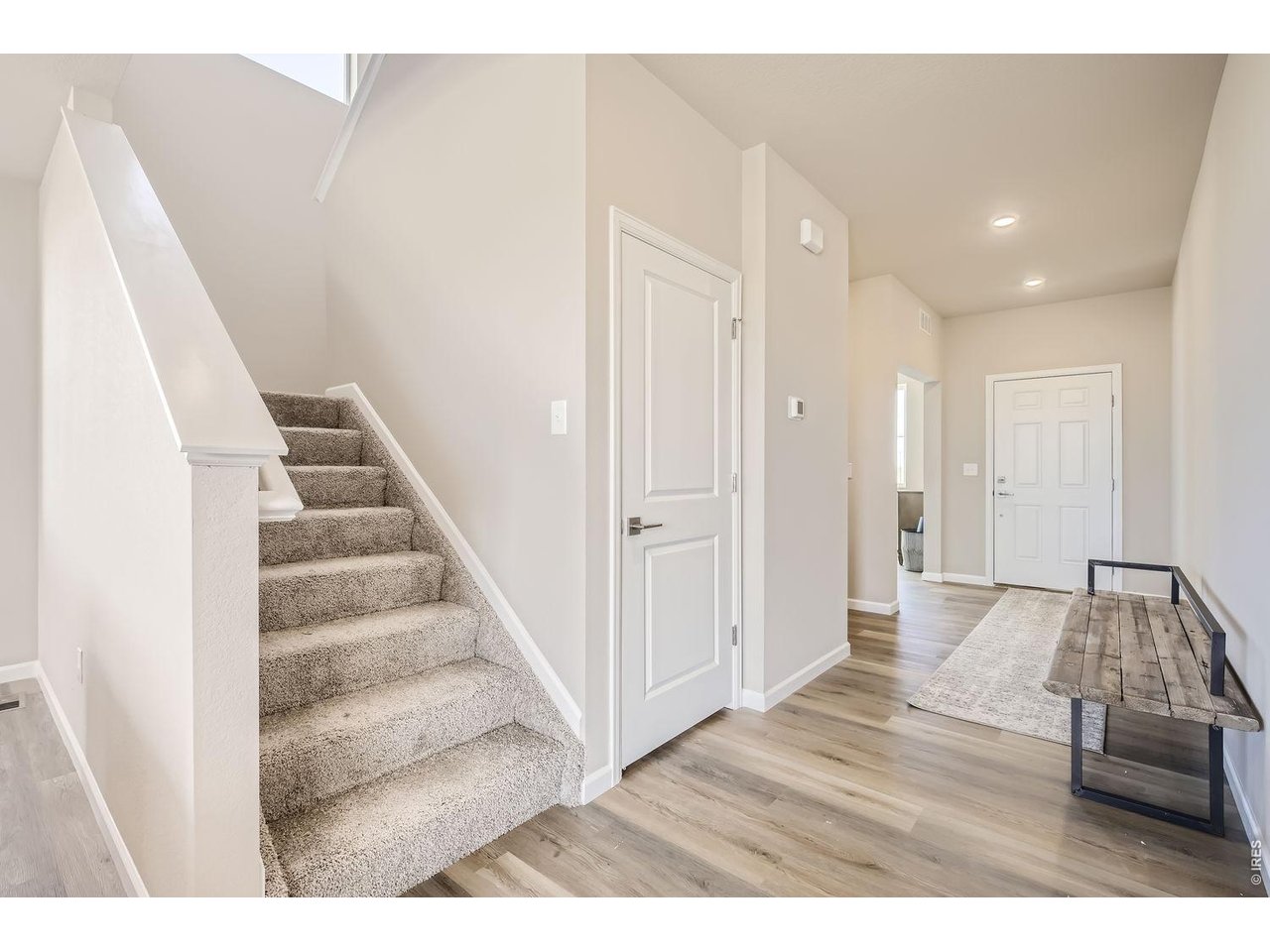Property Photo 10 Foyer and door to basement