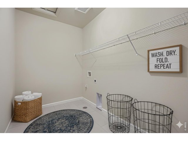 Property Photo 21 Large laundry room on the upper level, near bedrooms (and Attic Access)