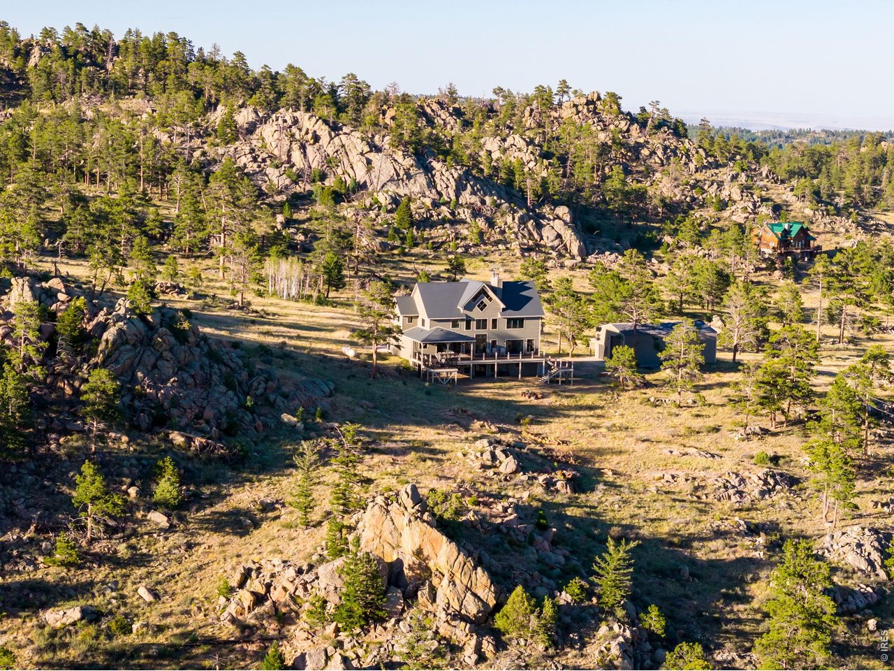 Property Photo 10 Tucked into the Rocky Mountains and abutting Roosevelt National Forest gives you hundreds of acres to enjoy