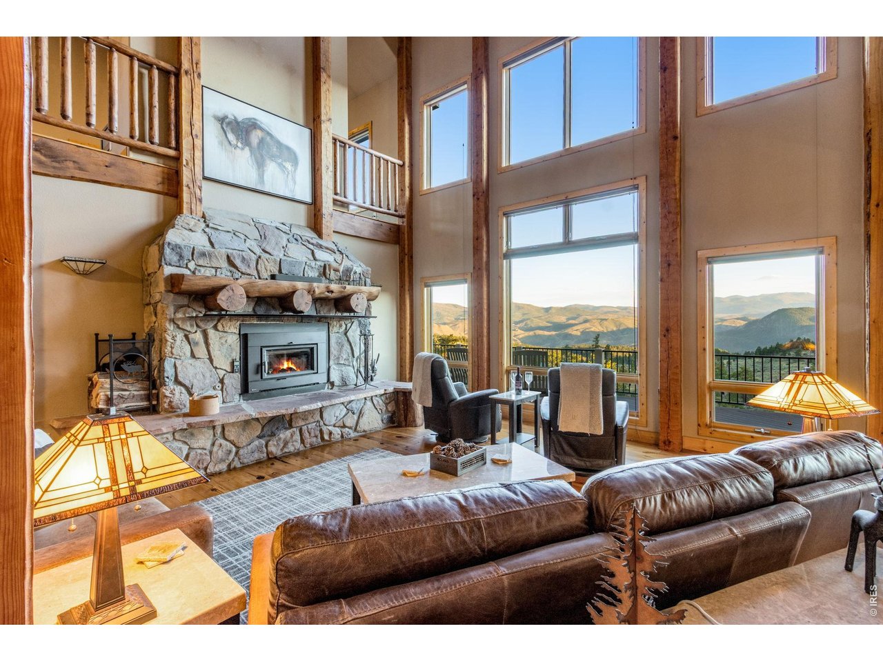 Property Photo 14 Family room with 33' high vaulted ceilings, NEW wood burning Regency fireplace, full length and flagstone hearth plus a custom log mantel