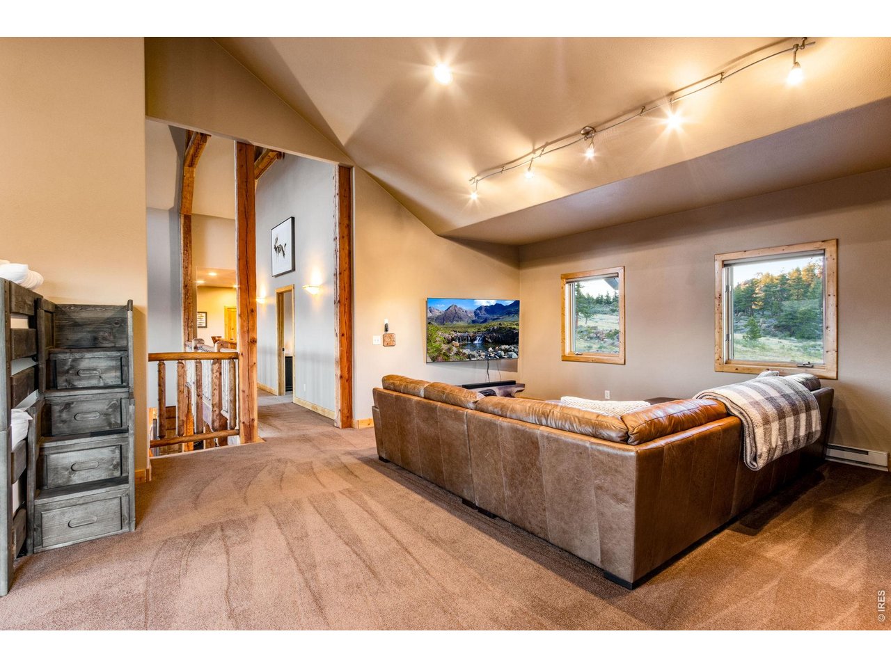 Property Photo 39 The loft can be used as another bedroom. It is also a great place to watch movies and gather with friends. Features a wet bar and private balcony.