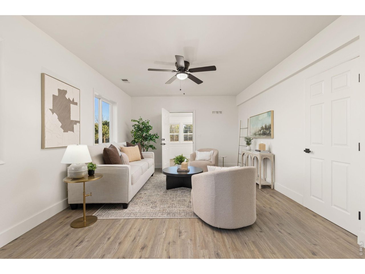 Property Photo 7 Bright and inviting main-level living space showcasing the farmhouse's thoughtfully updated interior.