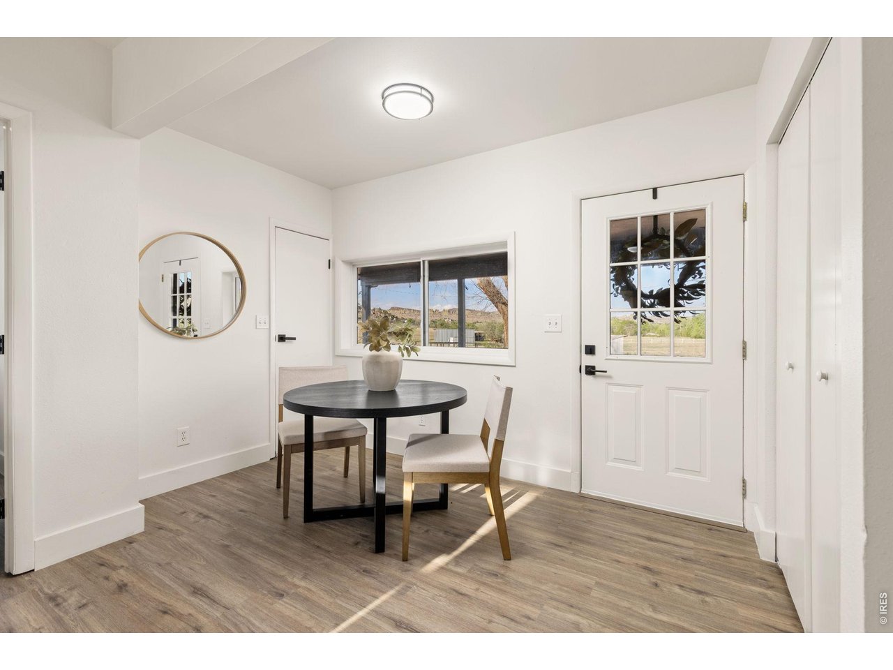 Property Photo 13 Bright breakfast nook provides an additional casual dining space with views across the property.