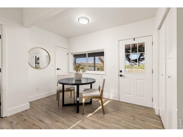 Property Photo 13 Bright breakfast nook provides an additional casual dining space with views across the property.