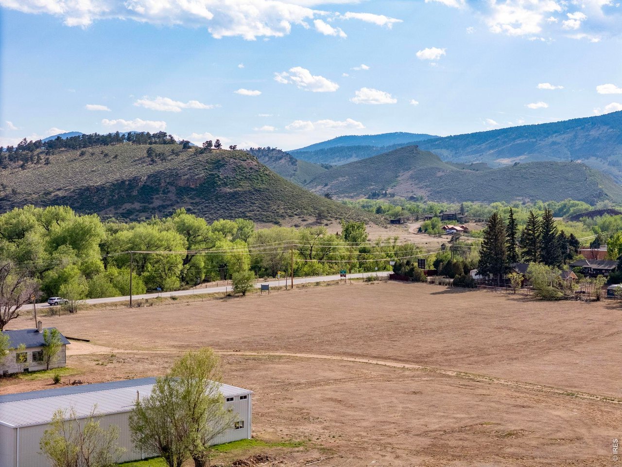 Property Photo 19 Foothills views provide a dramatic backdrop to this West Loveland property.