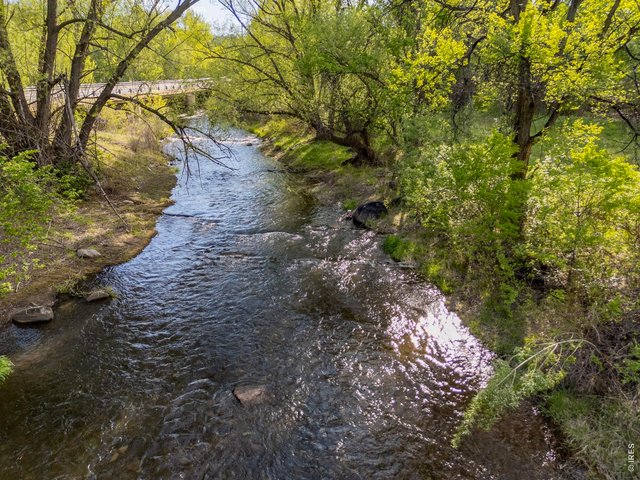 Property Photo 24 The Big Thompson River flows through the property, creating a wooded riparian corridor and valuable wildlife habitat.