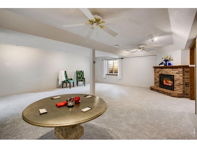 Property Photo 30 Corner Mendota gas fireplace with full mantel and brick backsplash