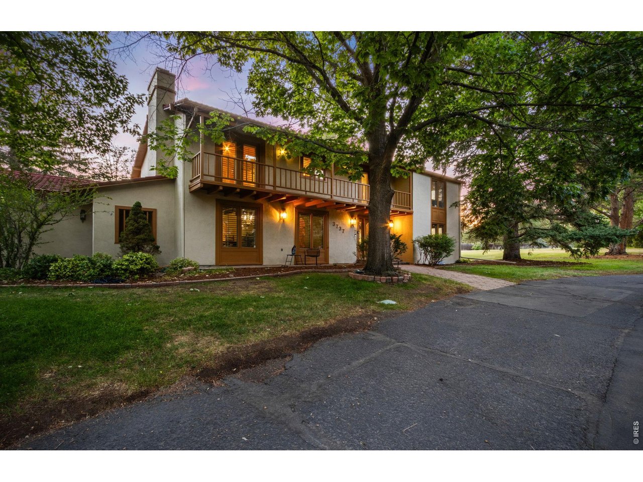 Property Photo 6 Timeless curb appeal featuring authentic Spanish Colonial architecture and new exterior paint.