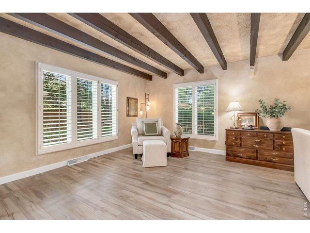 Property Photo 17 New luxury vinyl plank flooring complements the home's timeless character.