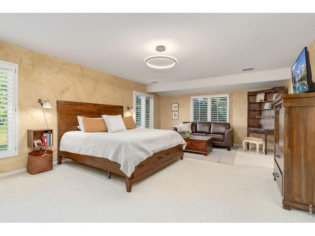 Property Photo 24 Spacious primary suite designed as a relaxing retreat.