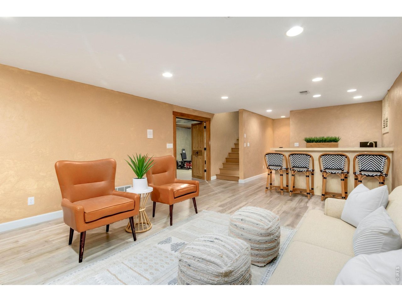 Property Photo 36 Cozy basement family room with fireplace and wet bar.