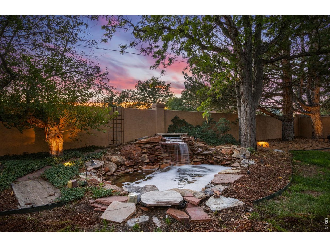 Property Photo 46 Decorative fountain enhances the peaceful backyard setting.