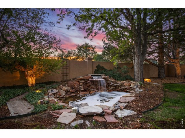 Property Photo 46 Decorative fountain enhances the peaceful backyard setting.