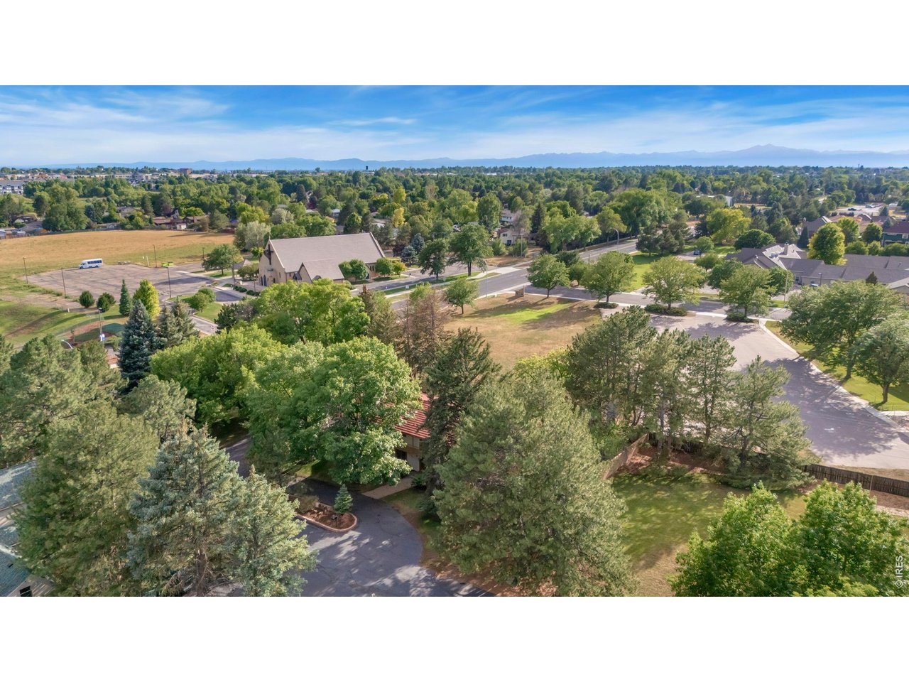Property Photo 50 A rare bird's-eye view showcasing the property's mature trees, expansive grounds, and exceptional privacy.