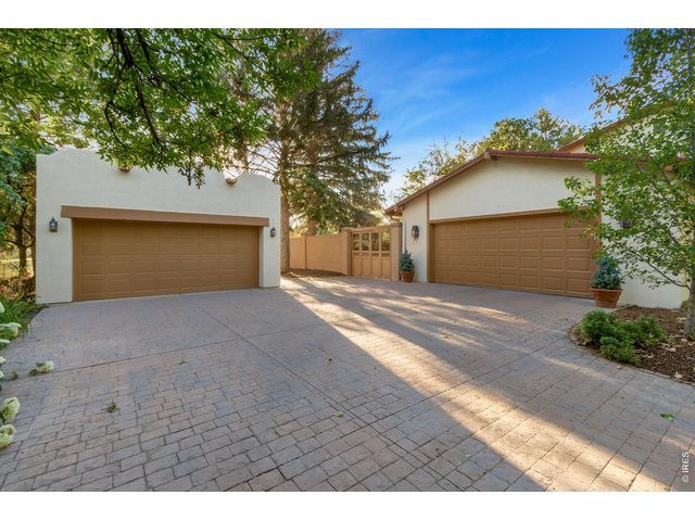 Property Photo 41 Detached two-car garage and shed provides additional space for vehicles, hobbies, or a workshop. Attached oversized two-car garage offers convenience and storage.