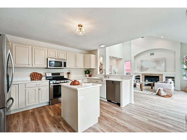 Property Photo 9 Kitchen Area- Open to Family Room