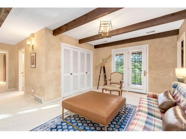 Property Photo 34 Built-in workstation makes the loft ideal for a home office or library.