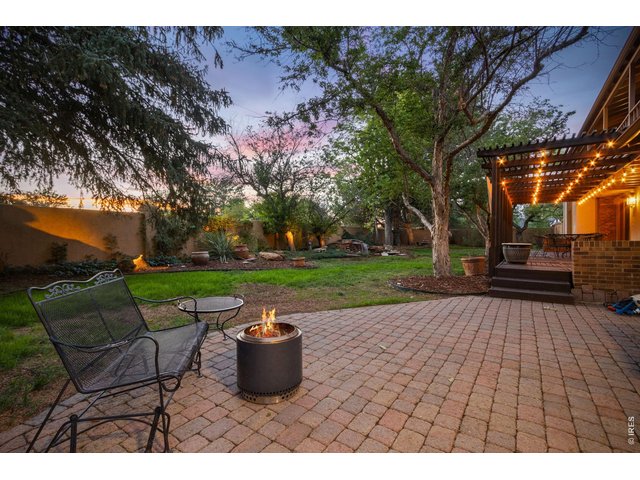 Property Photo 4 Multiple outdoor seating areas invite you to relax and entertain.
