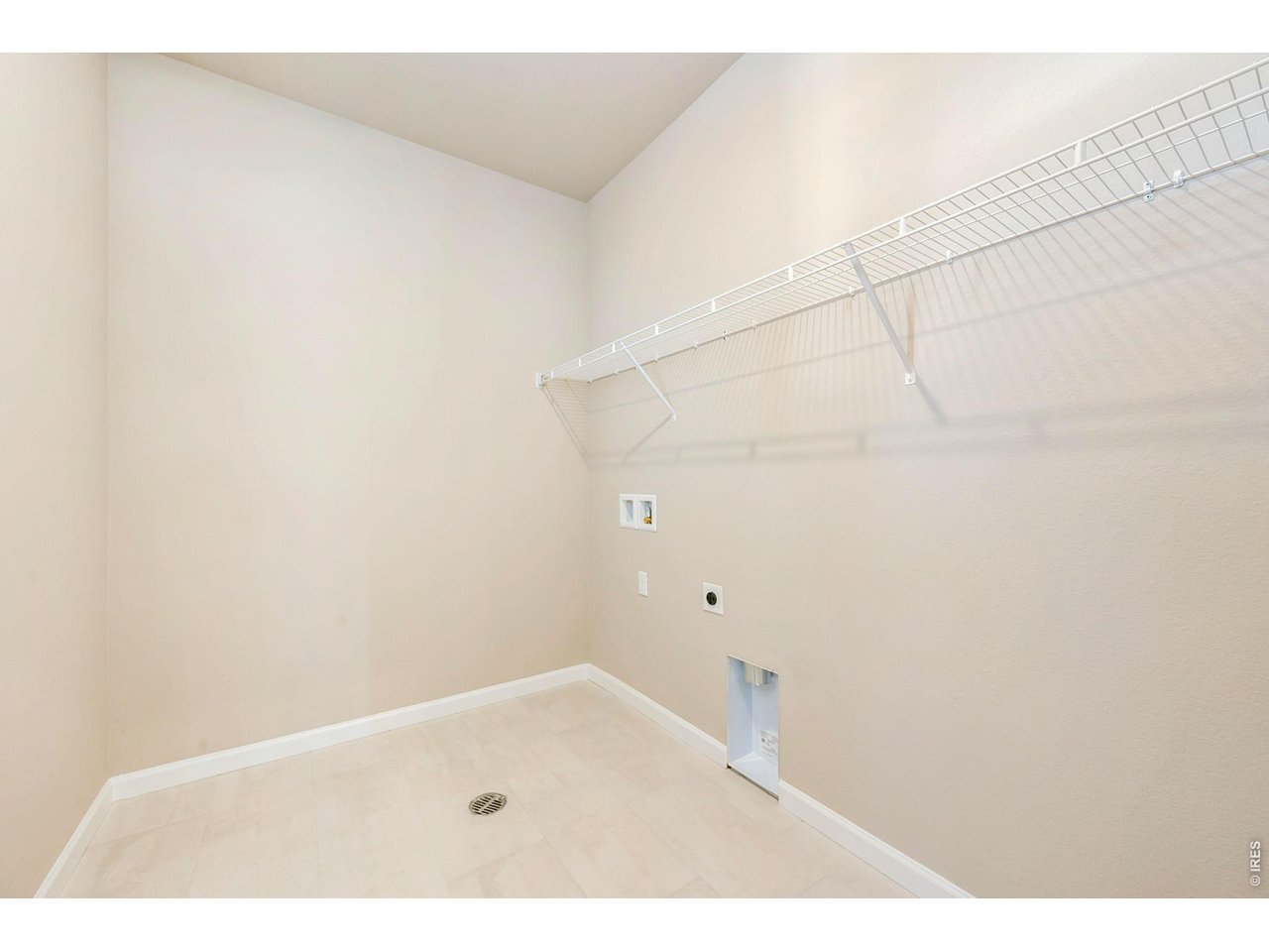 Property Photo 25 Upstairs Laundry