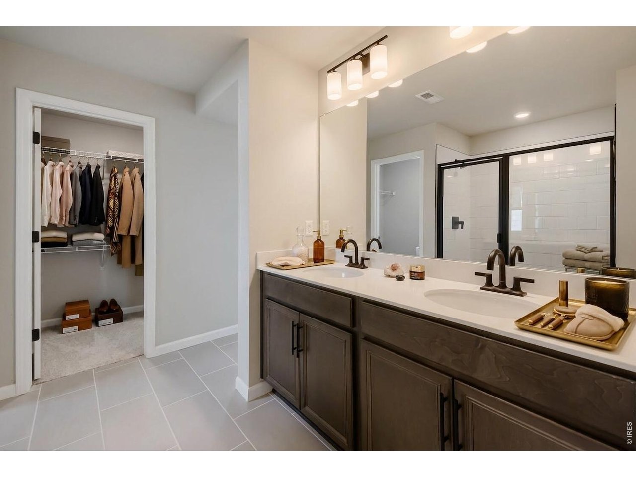 Property Photo 16 The primary bathroom has dual vanities and an amazing closet!