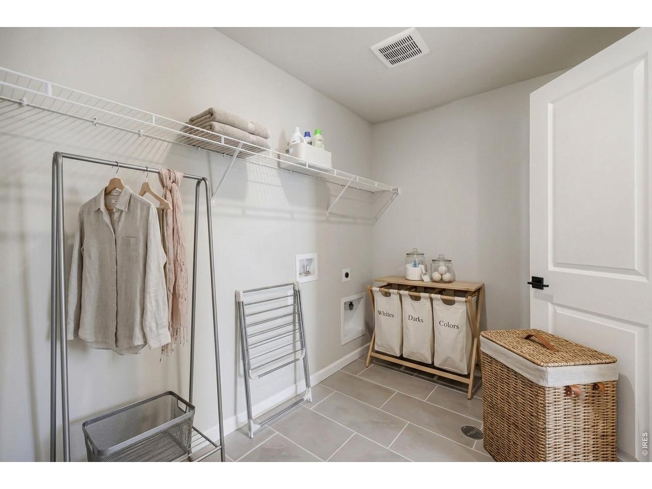 Property Photo 23 Spacious walk-in laundry room with hook-ups