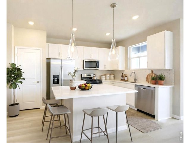 Property Photo 5 Quartz countertops, gas cooking