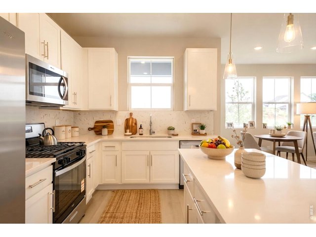 Property Photo 6 Soft-close cabinetry and gleaming quartz countertops
