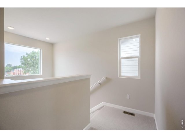 Property Photo 8 Lots of light floods in through the upper level windows