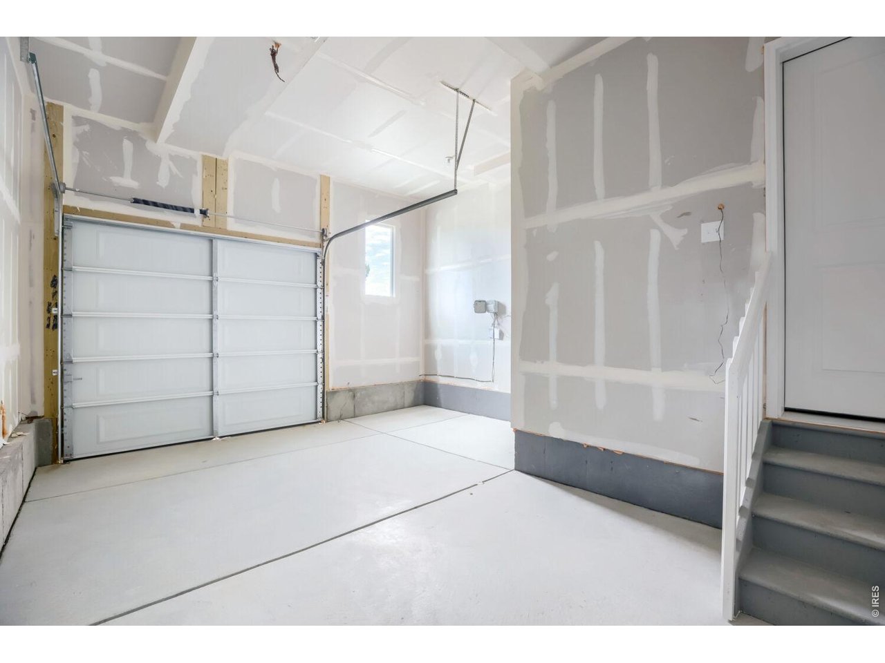 Property Photo 17 One-car attached garage with extra storage